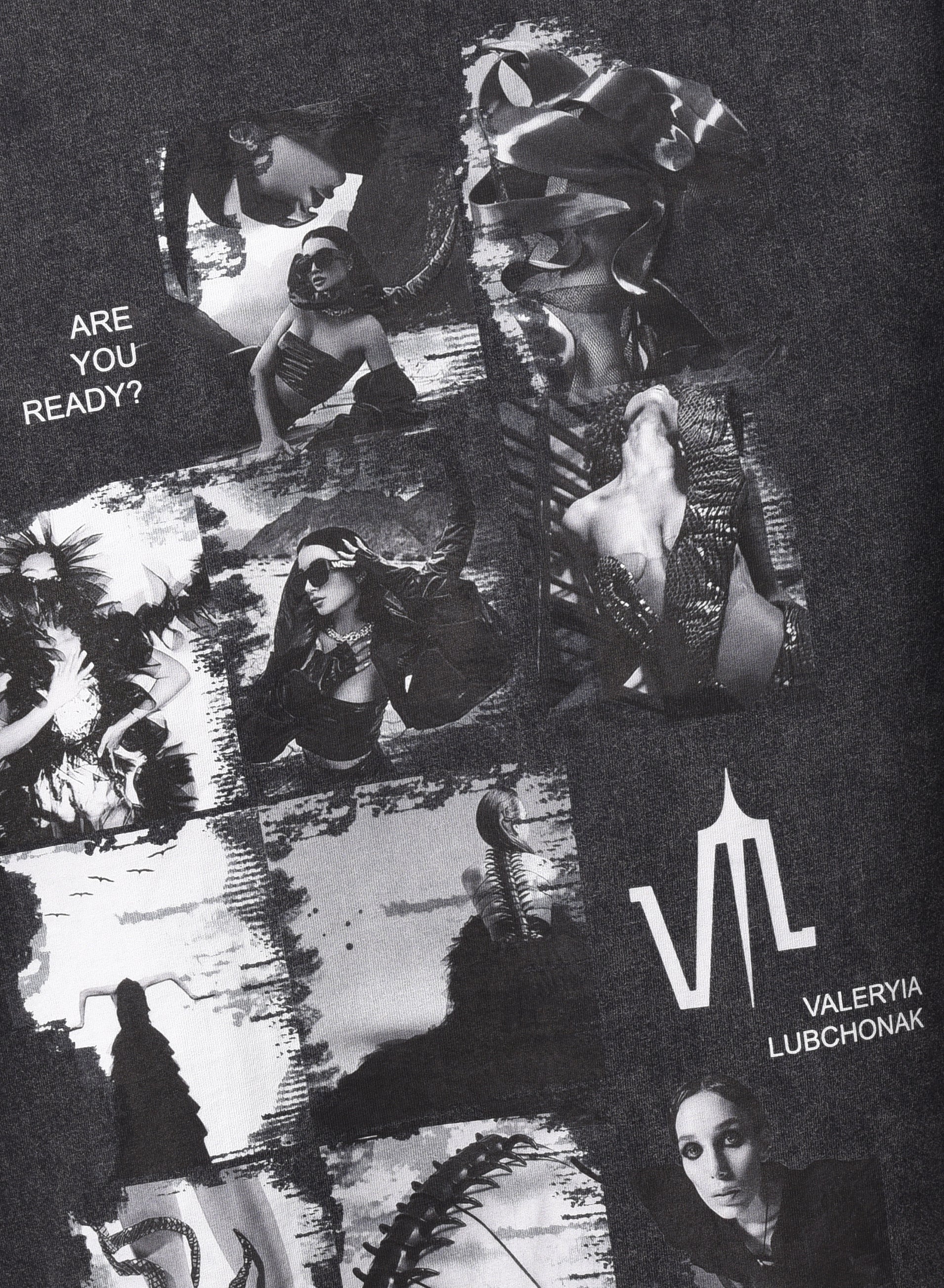 An acid wash black colored t-shirt, viewed from the front, with a big print of a photo montage and elements of the brand Valeryia Lubchonak, close-up.